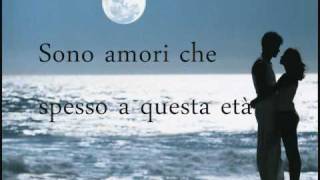 Laura Pausini  Strani Amori  lyrics [upl. by Novat471]