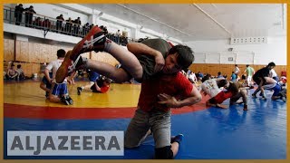 Wrestling for change Fighting a way of life in Dagestan [upl. by Animrac]