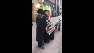 Chassidish Yungerman Deals With Neturei Karta In Manhattan [upl. by Airamasor761]