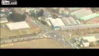 Aerial view of tsunami striking Sendai Japan [upl. by Anayek]