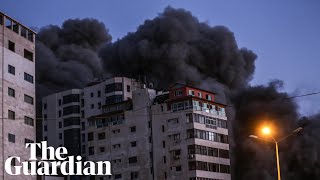 Israeli airstrike collapses tower block and Hamas rocket hits bus as violence escalates [upl. by Luciano]